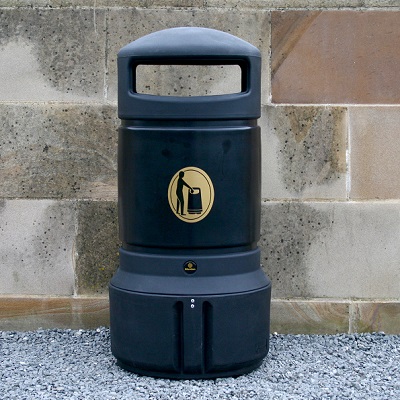 TSU sack holder mounted to a wall in public space