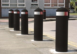 Buffer™ flexible verge marking bollards in a row by building