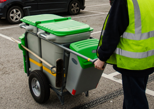 Double Space-Liner™ with two-compartments and green lid and moulding being manually pushed