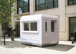 Genesis™ 2.7m x 2.2m Modular Kiosk Enclosure in front of bank
