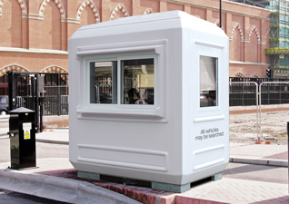 Genesis™ GRP Modular Housing in white with front and side windows outside building