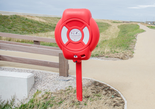 Guardian™ post mounted water safety equipment housing outside residential housing