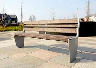 Two Alturo seats with a Fusion litter bin in a public park