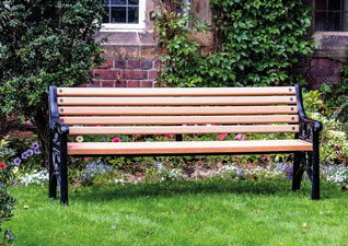 Two Alturo seats with a Fusion litter bin in a public park