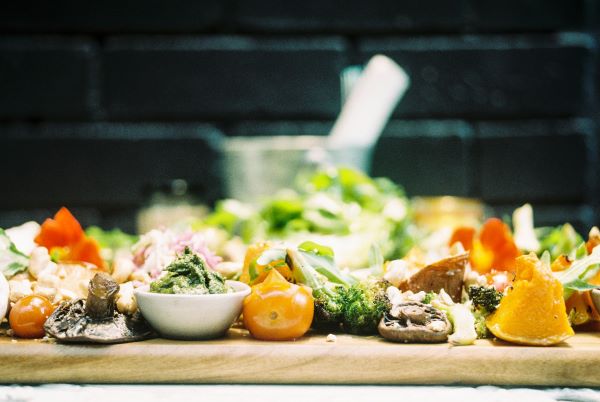 food waste on a wooden tray