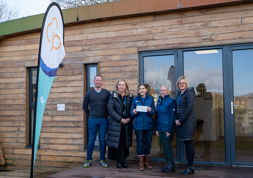 Glasdon handing over grant cheque to Park View representatives