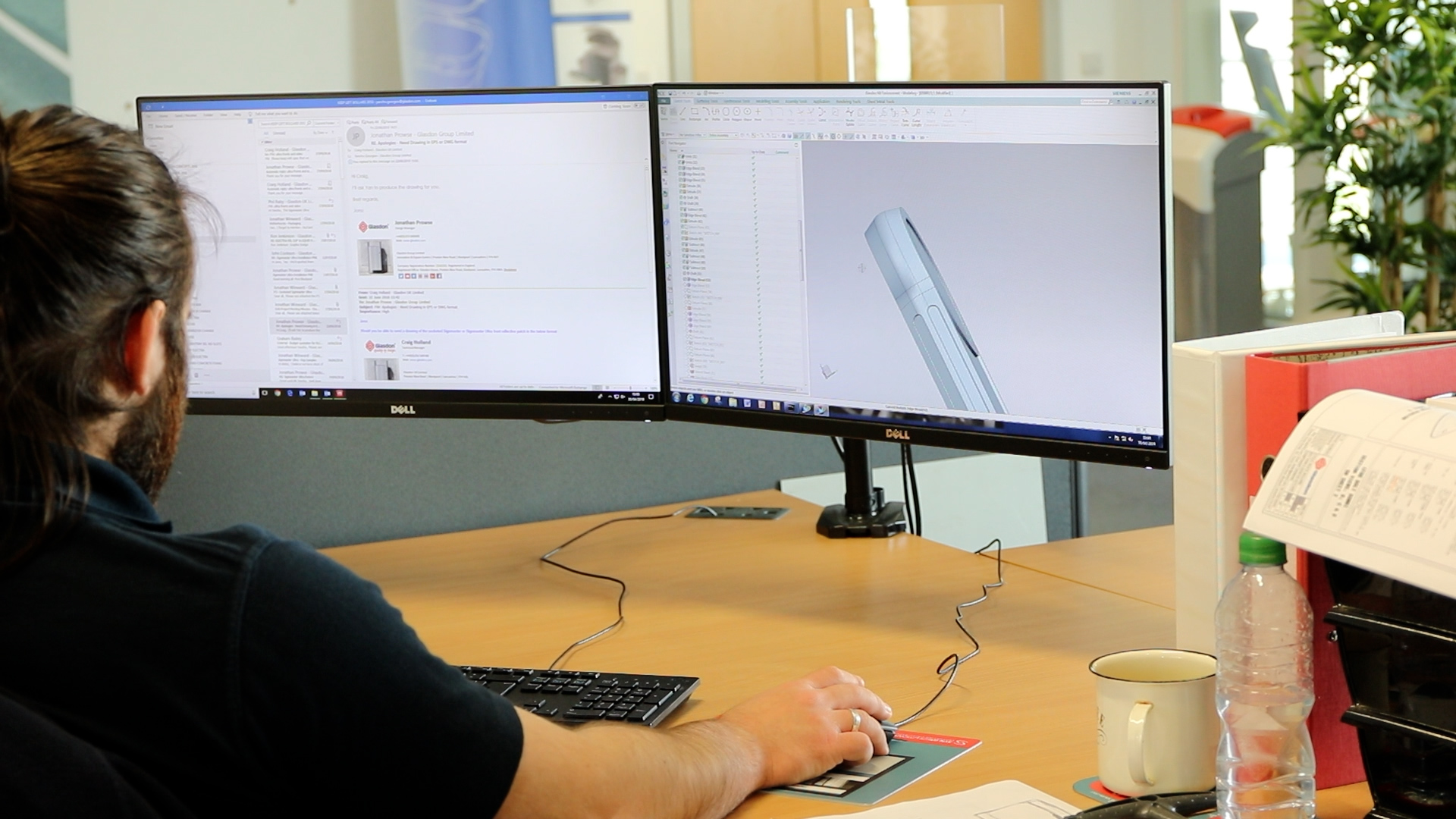 man on computer designing a product