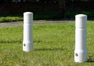 White Edgeliner™ Bollards on Grass Verge
