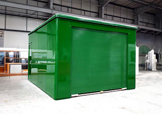 Large Garrison™ GRP Housing by Glasdon in green.