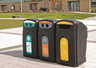 Three Nexus® 360 Recycling Bins outside an apartment complex