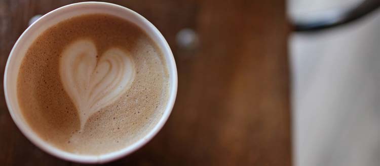  disposable cup filled with coffee