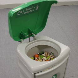 Green food waste graphic on a Nexus Shuttle Catering Bin