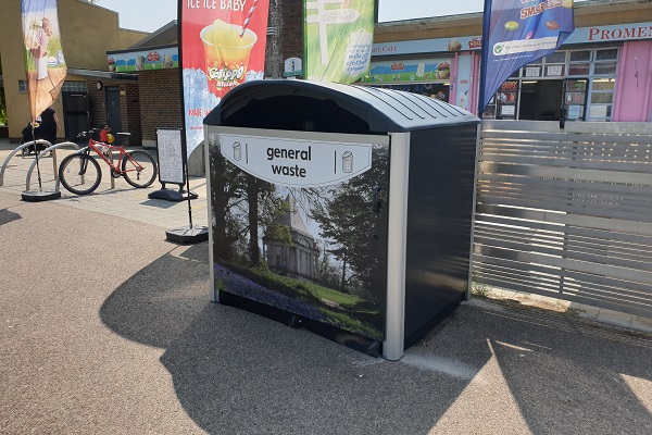 A general waste Modus outside a ice cream shop