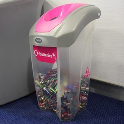 a cthru nexus 30 recycling bin with blue battery graphics half filled with batteries