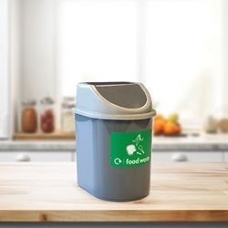 nexus 2.5 desktop recycling bin with green food waste graphics on a kitchen countertop