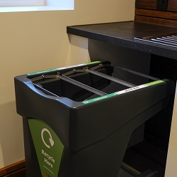 Nexus Caddy with green recycle here graphic