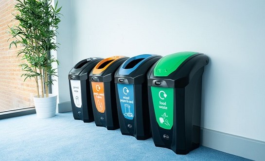 four nexus 30 recycling bins together in an office setting with simpler recycling waste streams