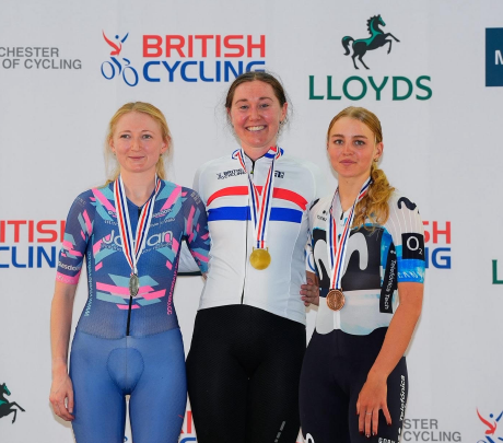 a team jadan cyclist on the podium at the track nationals with a silver medal