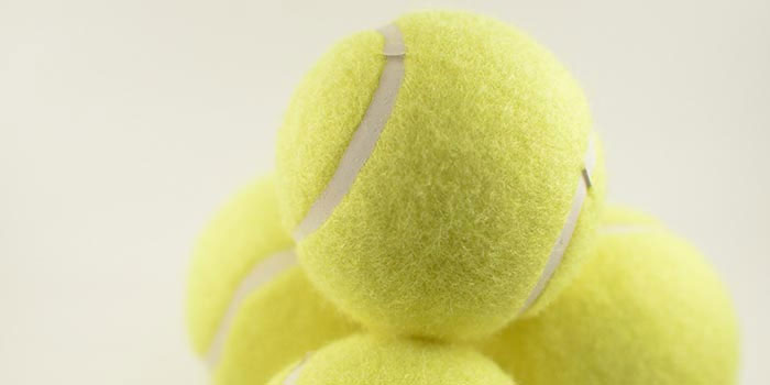 Four tennis balls