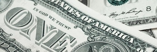 A pile of one dollar bills